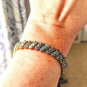 18k/sterling silver emerald bracelet.